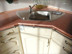 Gebogene Edelstahlstange: Umrandung für Arbeitsplatte in der Küche, Trapez-Form