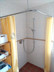 Winkel-Duschvorhangstange für behindertengerechte Dusche